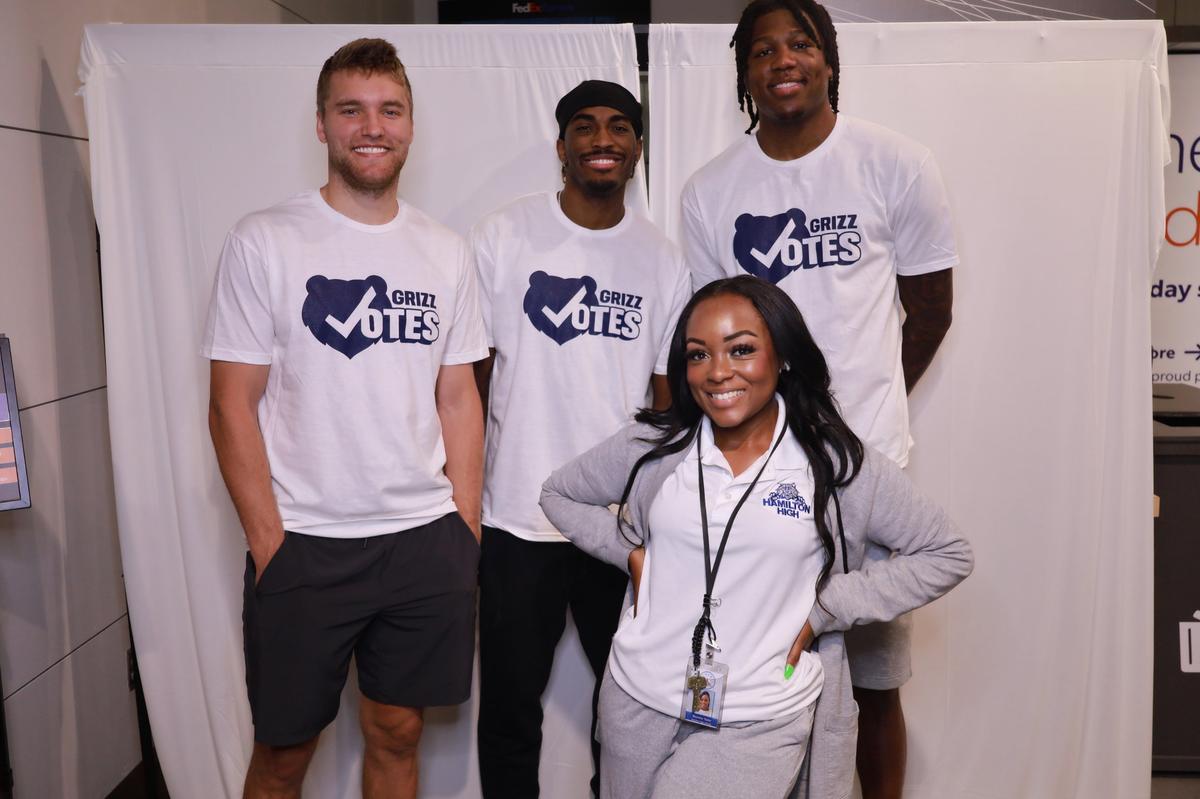 Destinee with Memphis Grizzlies players