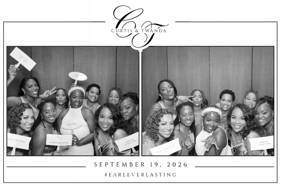 Bridesmaids having fun in the photobooth