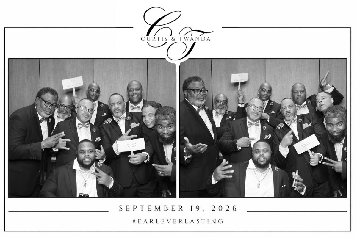 Groomsmen celebrating in the photobooth